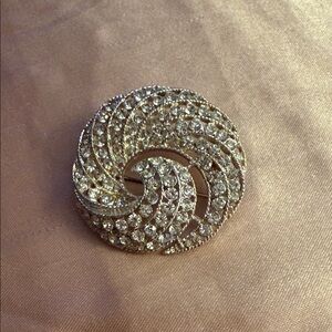 Elegant Crystal Swirl Brooch